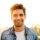 photo-of-joyful-unshaven-man-smiling-and-looking-a-2025-02-14-21-33-02-utc.jpg